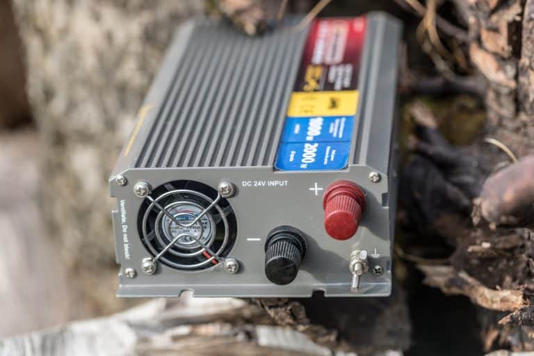 What Is a Power Inverter? - 12V DC to 230V AC Inverter. Photo By: Saad via Adobe Stock